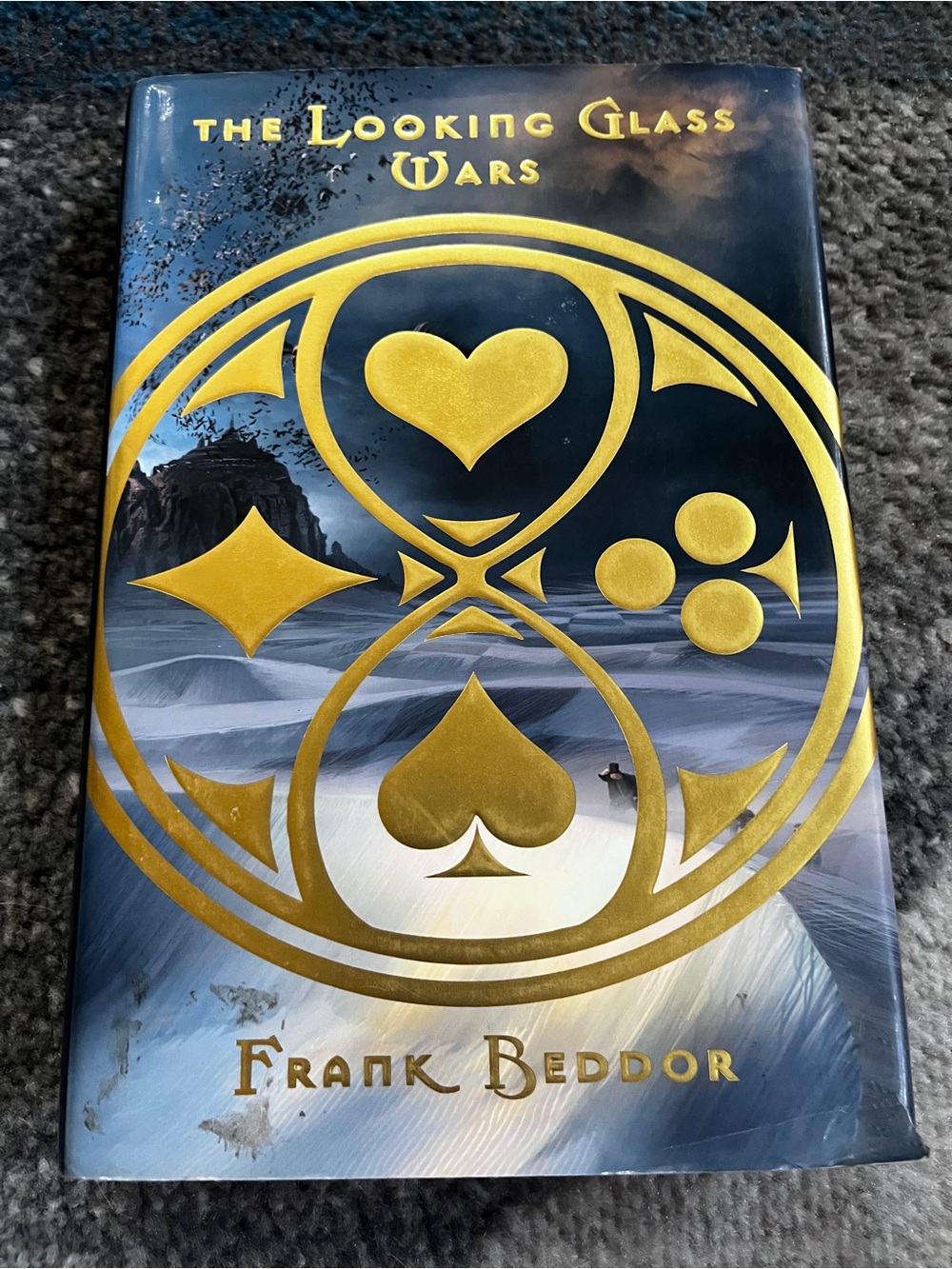 The Looking Glass Wars Hardcover Book - Gold on Blue by